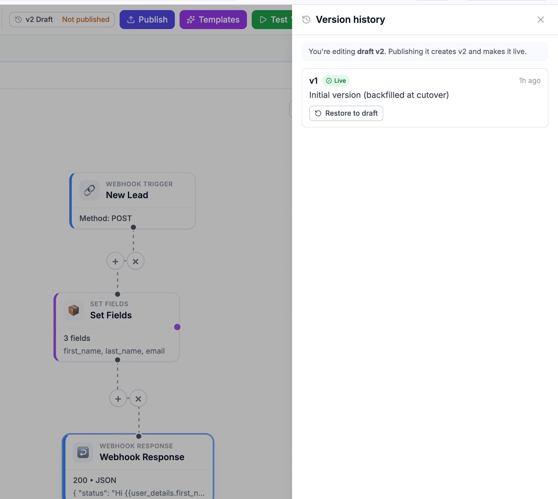 Version history panel showing draft v2 and live v1 with a restore-to-draft button
